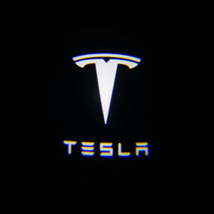 Tesla puddle light logo on a black background